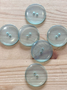 02-2548 End of Line Transparent Turquoise Coat Button - 54L