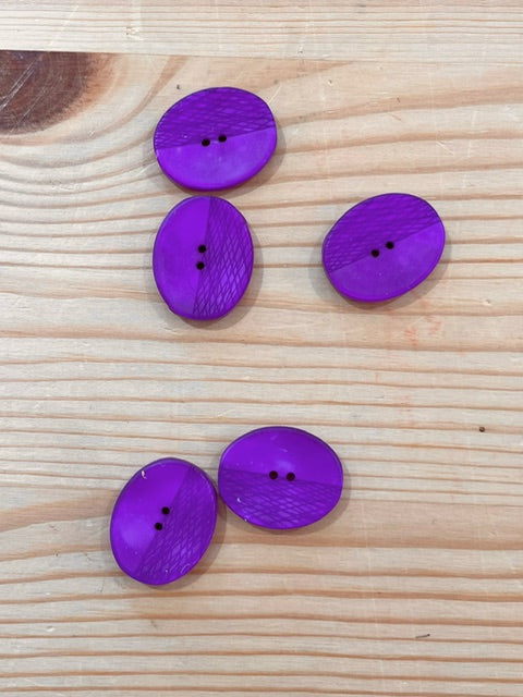 02-2446 End of Line Laser Purple Oval Button- 36L